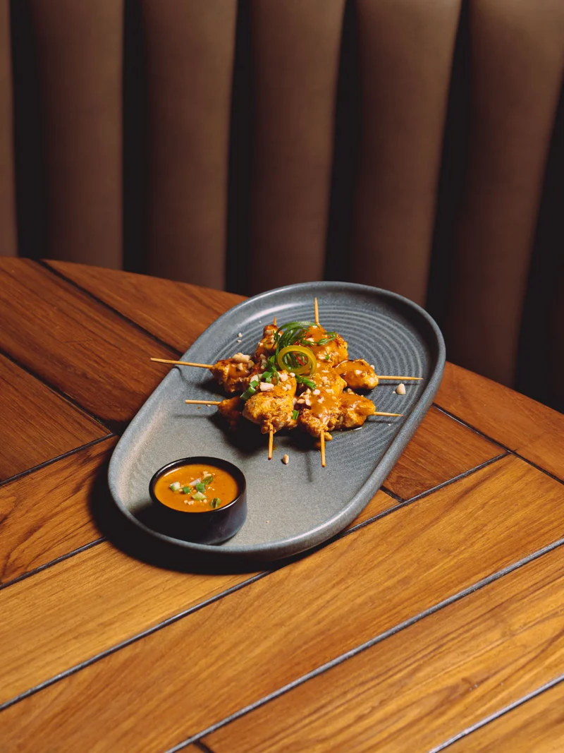 Crispy fried skewers with dipping sauce