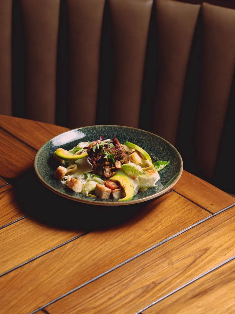 Creamy soup garnished with crispy bacon