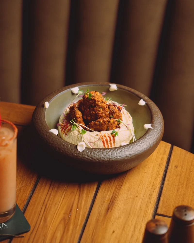 Spiced meat dish with yogurt sauce