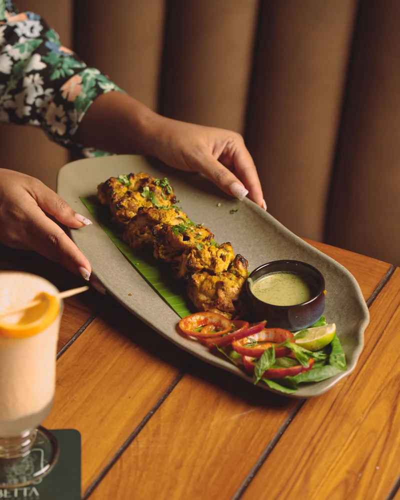 Charred seafood skewer with dipping sauce